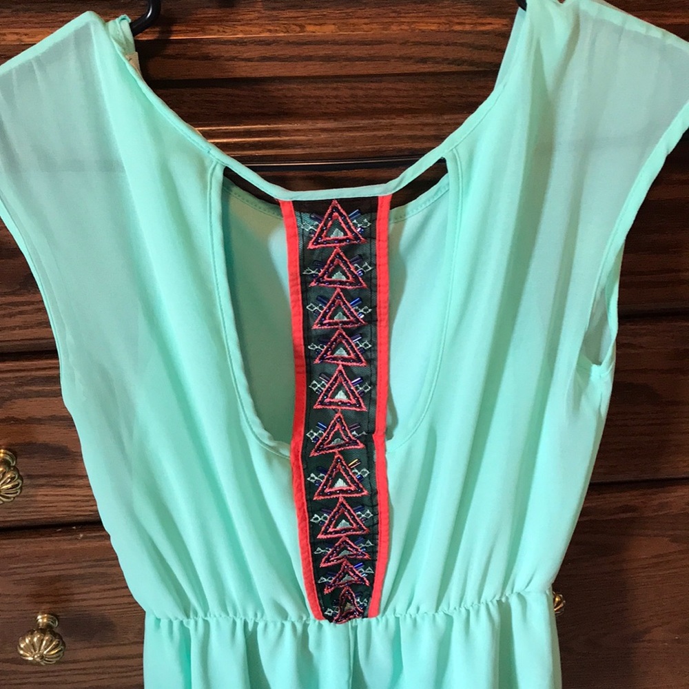 Mint green dress with designed back